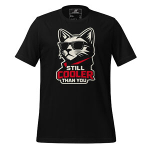 Black t-shirt featuring a large graphic of a cat wearing sunglasses with the text "STILL COOLER THAN YOU" below.